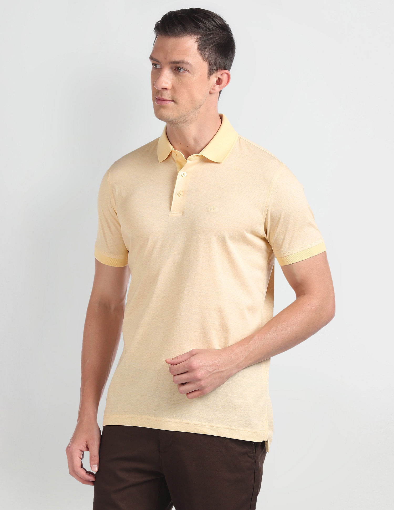 cream color polo shirt