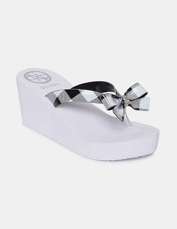 White bow best sale flip flops