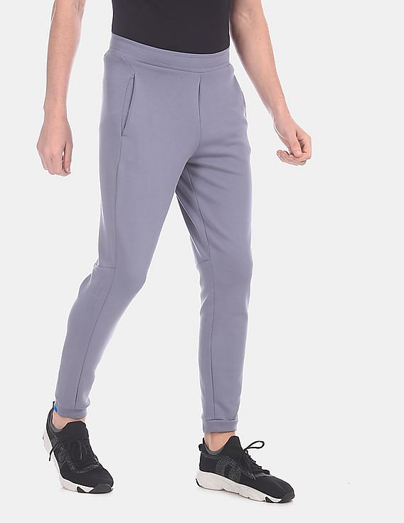 Buy Calvin Klein Men Grey Elasticized Waist Solid Stretch Joggers NNNOW