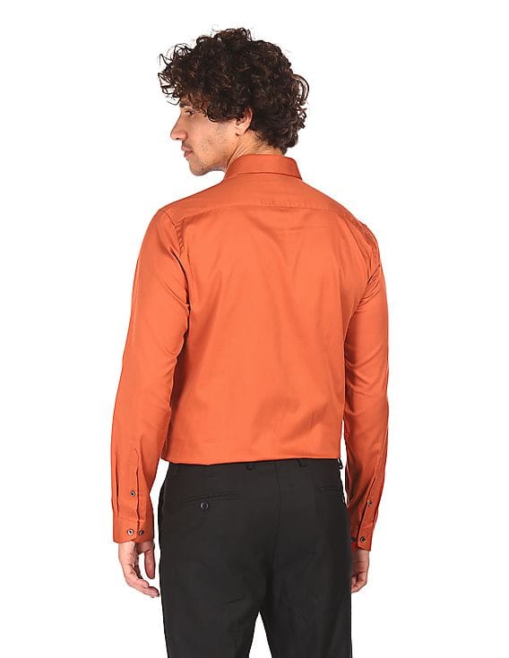 Buy Arrow Men Orange Slim Fit Solid 