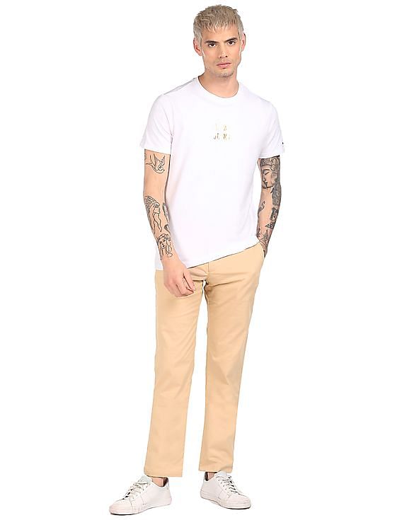 Tommy Hilfiger Men Beige Denton Regular Fit Solid Casual Trousers