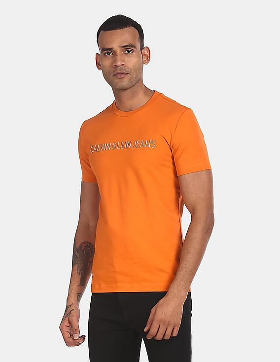 Buy Calvin Klein Men Orange Slim Fit Institutional Jelly Metalic Logo T- Shirt | T-Shirts