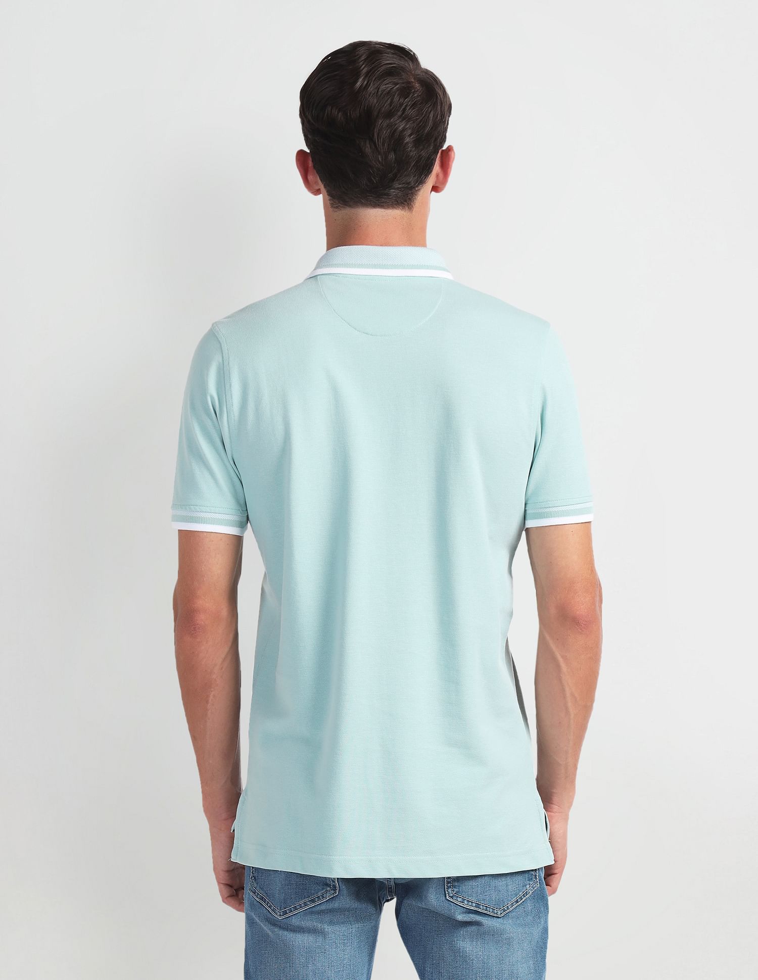 Arrow Sports Striped Collar Solid Polo Shirt