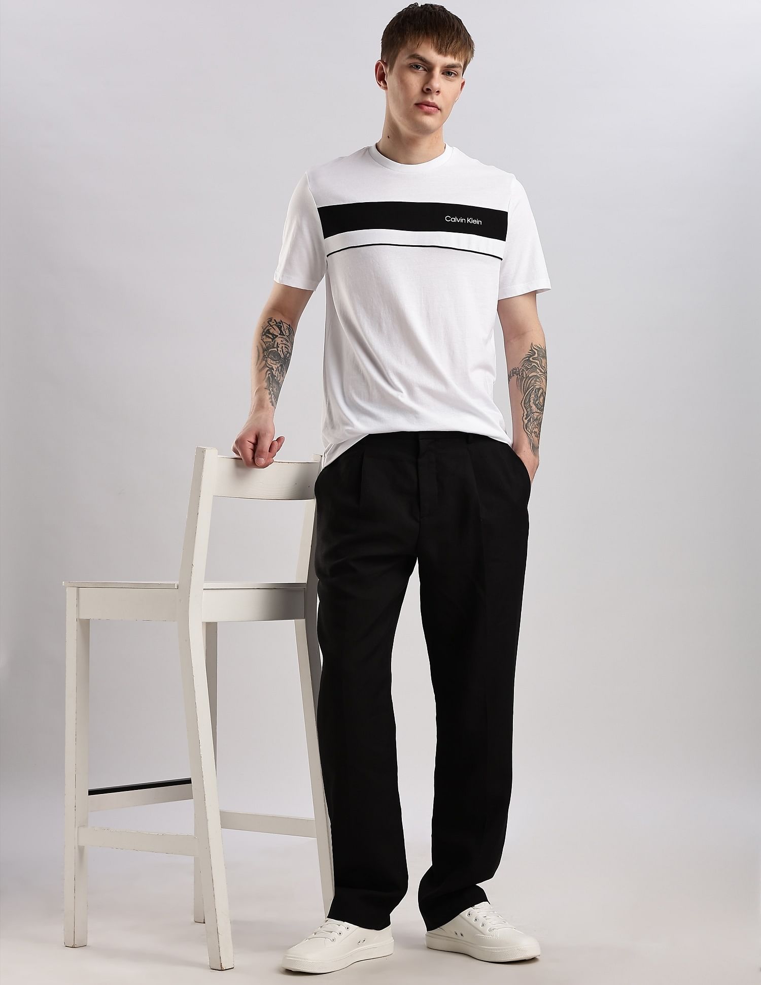 Calvin Klein Jeans Slim-Fit Solid Mid Rise Trousers