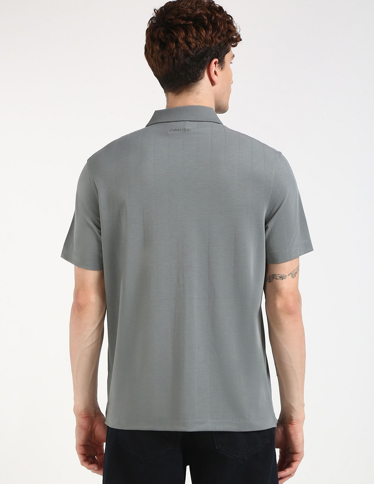 Calvin Klein Jeans Striped Regular-Fit Polyester Polo T-Shirt