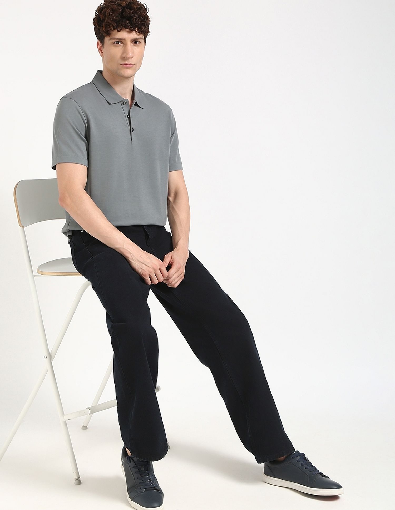 Calvin Klein Jeans Striped Regular-Fit Polyester Polo T-Shirt
