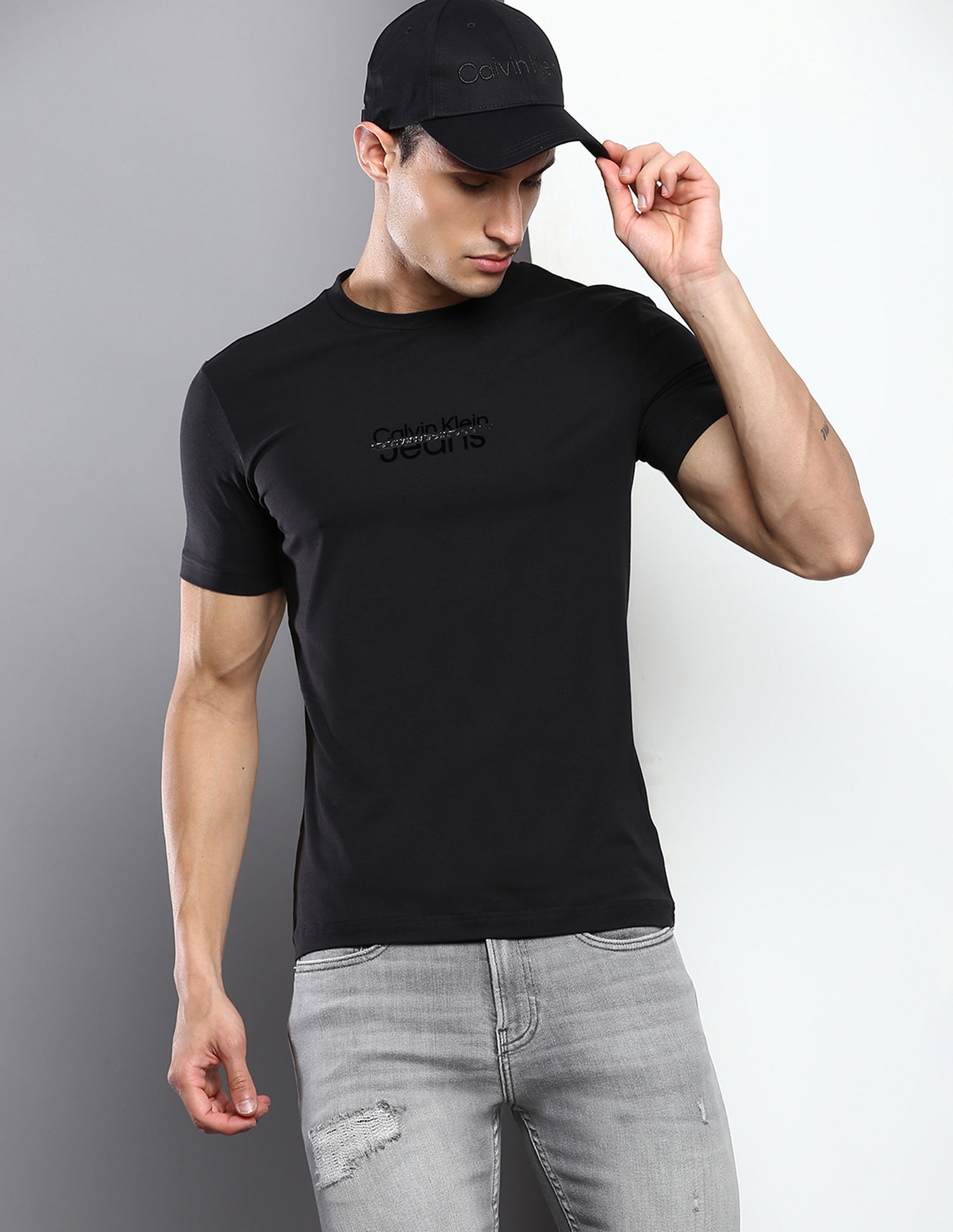 CALVIN KLEIN JEANS - Men's T-shirt with disrupted logo - black