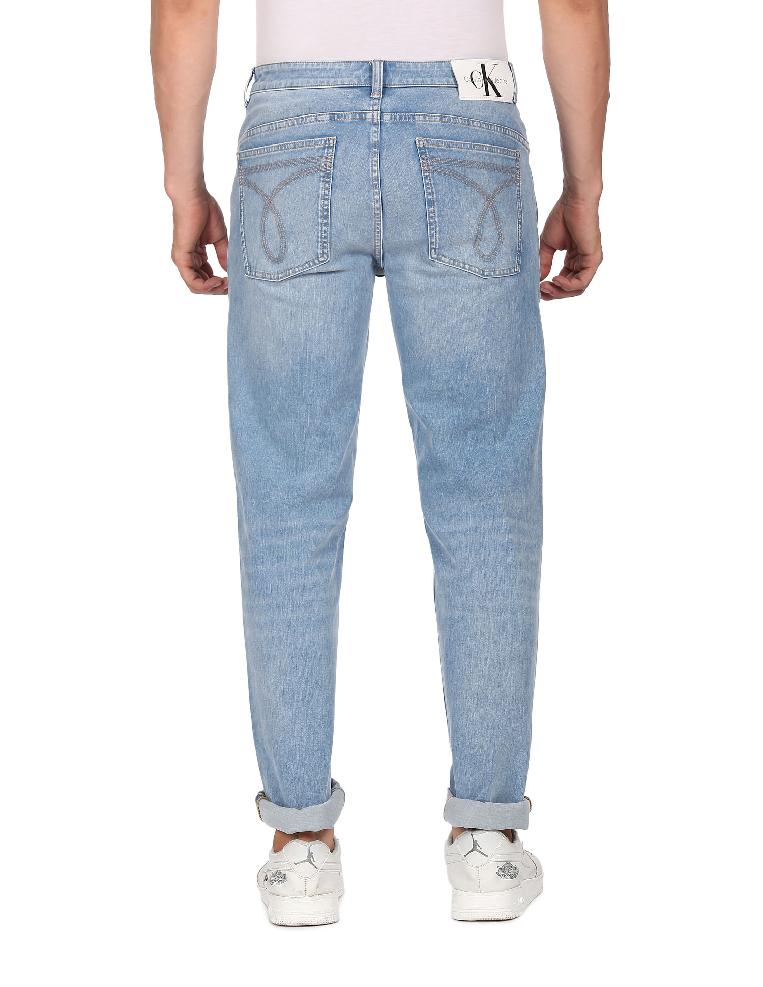 Buy Calvin Klein Jeans Men Light Blue Body Fit Stone Wash Jeans - NNNOW.com