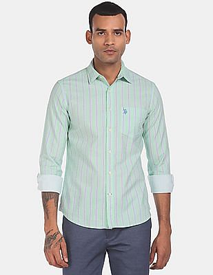 green and blue striped shirt