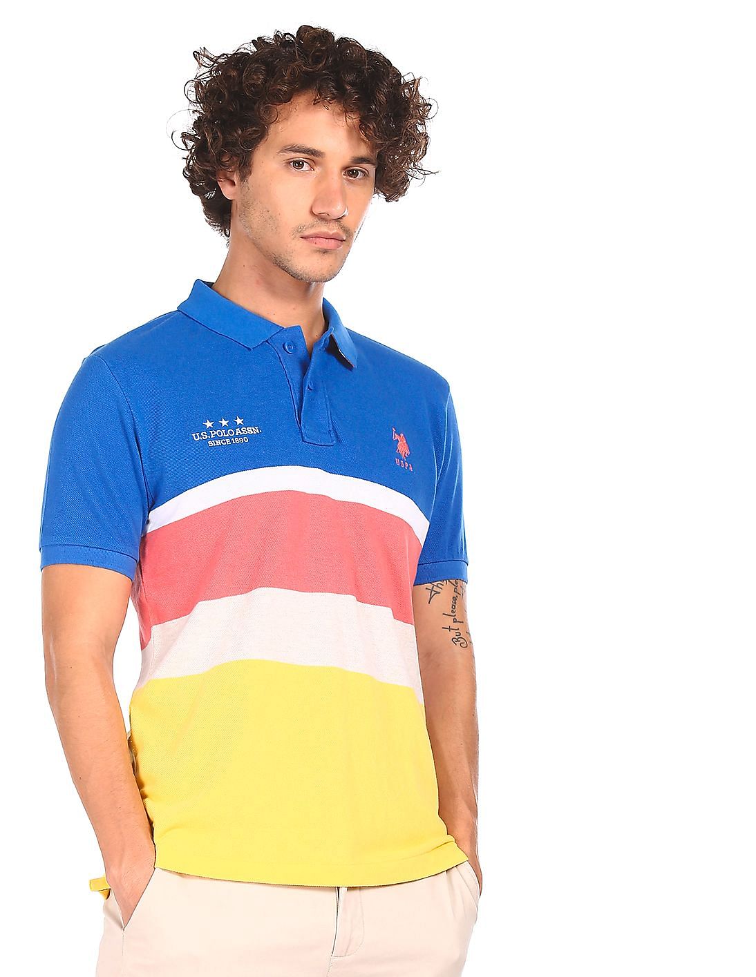 blue and yellow striped polo shirt