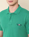 U.S. Polo Assn. Men Teal Short Sleeve Solid Pique Polo Shirt