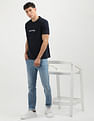 Tommy Hilfiger Round Neck Scroll Graphic T-Shirt