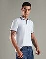 Tommy Hilfiger Solid Regular Fit Cotton Polo T-Shirt