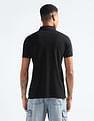 Flying Machine Logo Badge Solid Polo Shirt