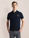 U.S. Polo Assn. Ribbed Collar Solid Polo Shirt